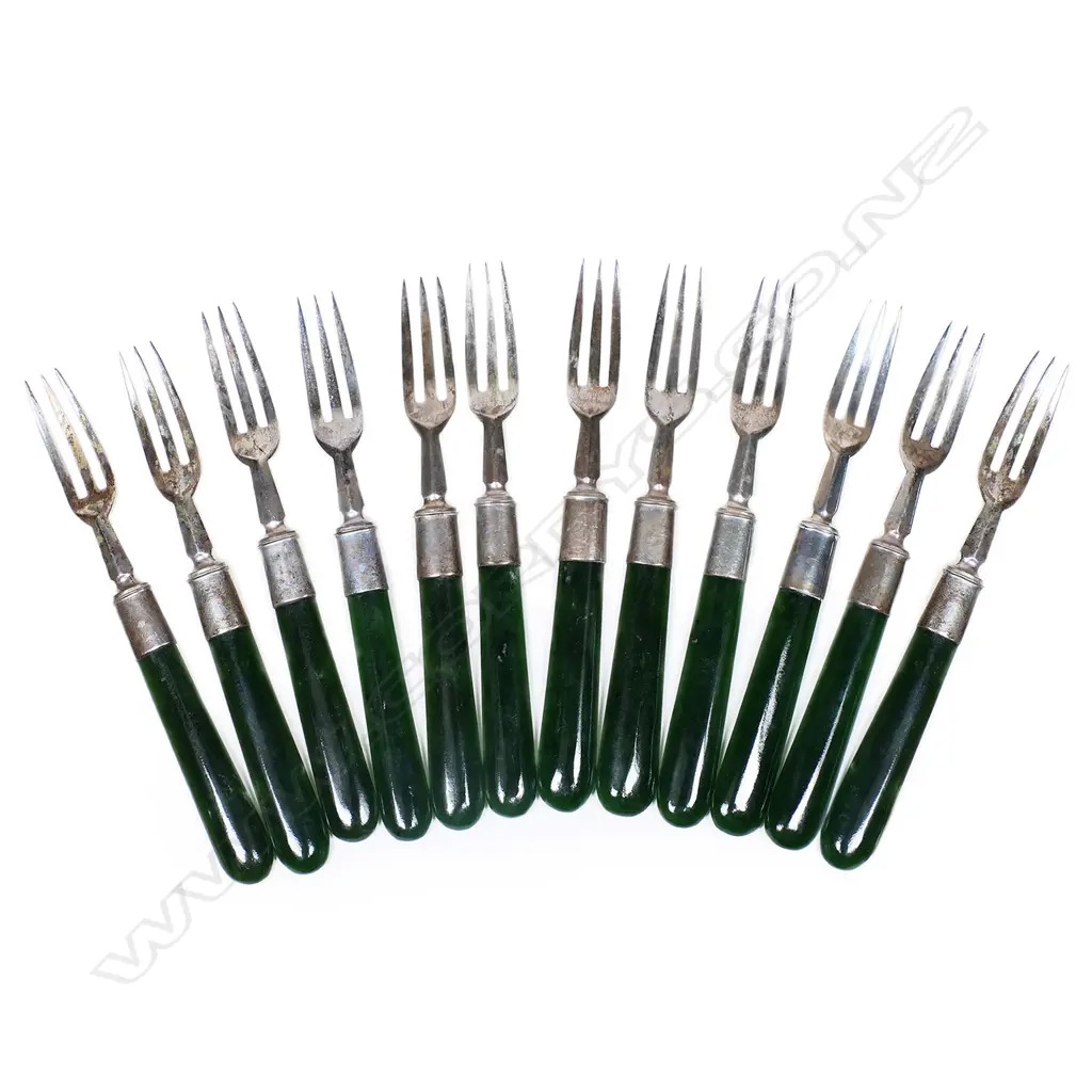 A set of 12 Heinrich Kohn (Auckland) silver and greenstone pickle forks, Image 1++